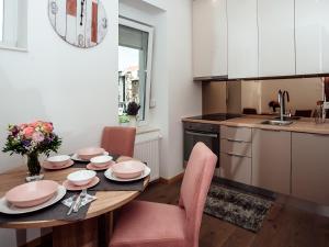Kuchyňa alebo kuchynka v ubytovaní Citylux Apartments