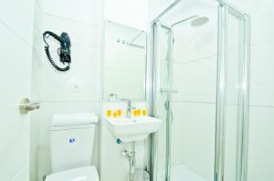 Kúpeľňa v ubytovaní NineSuites