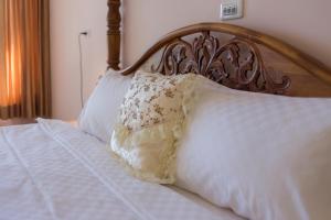 Giường trong phòng chung tại Gengmengyuan B&B