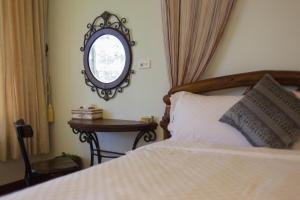 Giường trong phòng chung tại Gengmengyuan B&B