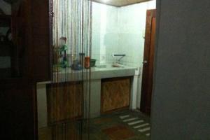 a bathroom with a sink and a counter top at SHALOM CAMP in El Nido