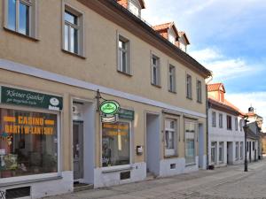 a row of buildings on a city street at Spacious Apartment in Ballenstedt Harz near Lake in Ballenstedt