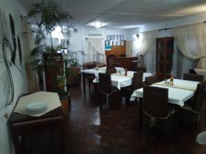 A restaurant or other place to eat at Kuku Royal Lodge