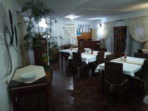 A restaurant or other place to eat at Kuku Royal Lodge