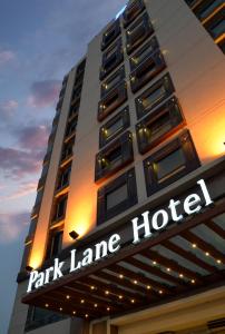 a building with a park lane hotel sign on it at Park Lane Hotel Lahore in Lahore