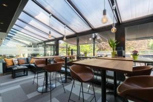 Posezení v ubytování Fletcher Hotel-Restaurant Jagershorst-Eindhoven