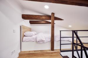 Кровать или кровати в номере Nordian