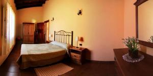 Een bed of bedden in een kamer bij Finca La Bonita