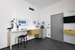 TV a/nebo společenská místnost v ubytování nautilus b&b suite design
