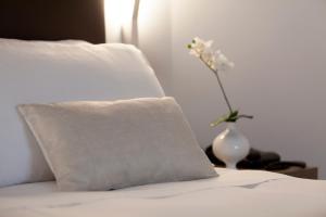 Postel nebo postele na pokoji v ubytování Hotel Mentana, by R Collection Hotels