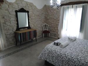 Postel nebo postele na pokoji v ubytování Casina di pietra