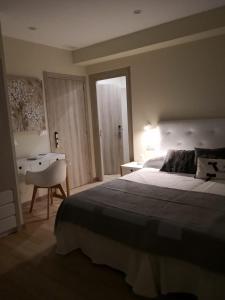 Posteľ alebo postele v izbe v ubytovaní A Torre do Lago