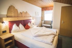 Posteľ alebo postele v izbe v ubytovaní Residence Sisi