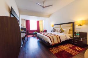 Hotel Natraj Rishikesh客房内的一张或多张床位