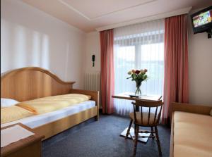 Postel nebo postele na pokoji v ubytování Pension Lärchenbrunn