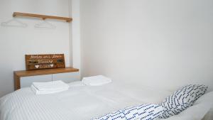 Postel nebo postele na pokoji v ubytování Apartments Milic