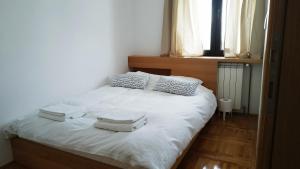 Postel nebo postele na pokoji v ubytování Apartments Milic