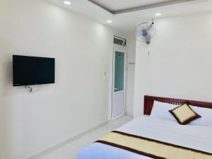 TV a/nebo společenská místnost v ubytování Mai Ngoc Hotel