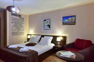 Postel nebo postele na pokoji v ubytování Hotel Ida