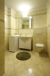 Kúpeľňa v ubytovaní Apartamenty Rok + 37 fotografií