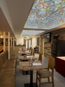 Posezení v ubytování Restaurace - Apartmány Bobule