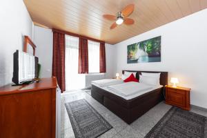 Postel nebo postele na pokoji v ubytování Hotel Avalon