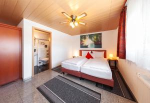 Postel nebo postele na pokoji v ubytování Hotel Avalon