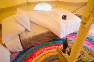 Glamping Finca Corazón客房内的一张或多张床位