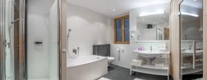 Koupelna v ubytování Apart Hotel Garni Wieser