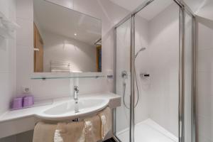 Koupelna v ubytování Apart Hotel Garni Wieser