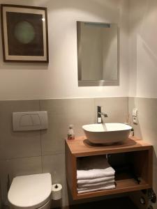 Baðherbergi á Apartment Hahnenkammblick