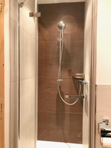 Baðherbergi á Apartment Hahnenkammblick