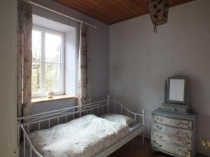 Łóżko lub łóżka w pokoju w obiekcie Müllers Ferienhaus Salzburgerland