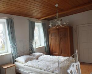 Łóżko lub łóżka w pokoju w obiekcie Müllers Ferienhaus Salzburgerland