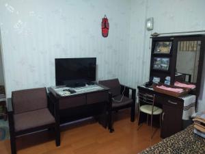 TV a/nebo společenská místnost v ubytování Dai Yi Shia B&B