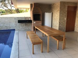 Kuchyň nebo kuchyňský kout v ubytování Apartamento Completo Jatiúca