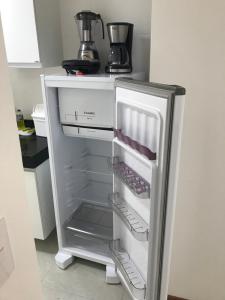 Kuchyň nebo kuchyňský kout v ubytování Apartamento Completo Jatiúca