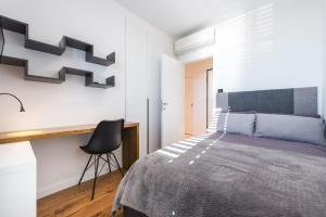 Postel nebo postele na pokoji v ubytování Saint Blaise Luxury Suite