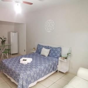 A bed or beds in a room at Pousada Encanto Das Aguas
