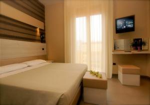 Postel nebo postele na pokoji v ubytování Hotel Rosenblatt