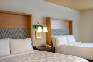 Holiday Inn Denver East by IHG客房内的一张或多张床位