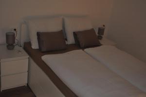 Postel nebo postele na pokoji v ubytování Apartments Home2 Zagreb