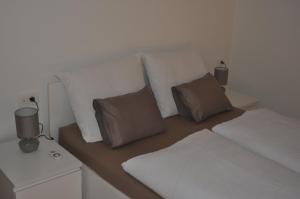 Postel nebo postele na pokoji v ubytování Apartments Home2 Zagreb