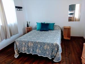 Voodi või voodid majutusasutuse Quintal Residencial toas