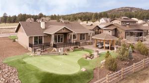 an aerial view of a house with a golf green at Fairway Getaway in Williams