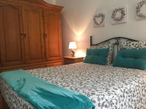 Postel nebo postele na pokoji v ubytování Apartamentosánchez