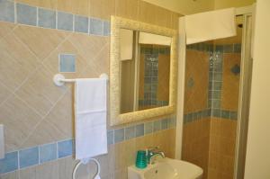 Koupelna v ubytování Hotel Verdesolemare