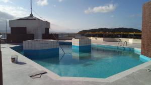 The swimming pool at or close to Boulevard Ponta Das Canas