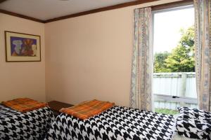 Postel nebo postele na pokoji v ubytování Holiday Haven