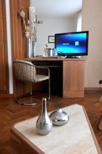 TV a/nebo společenská místnost v ubytování Grand Hotel Golf